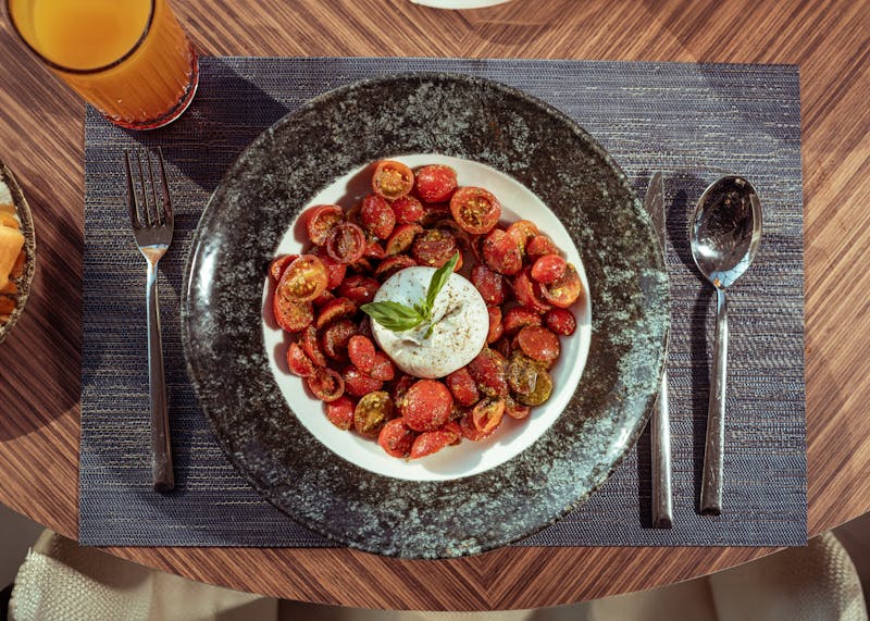 Burrata with roasted cherry tomatoes and basil oil starter