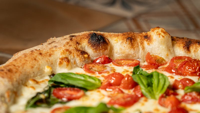 Classic Margherita Punch Pizza with fresh basil and mozzarella