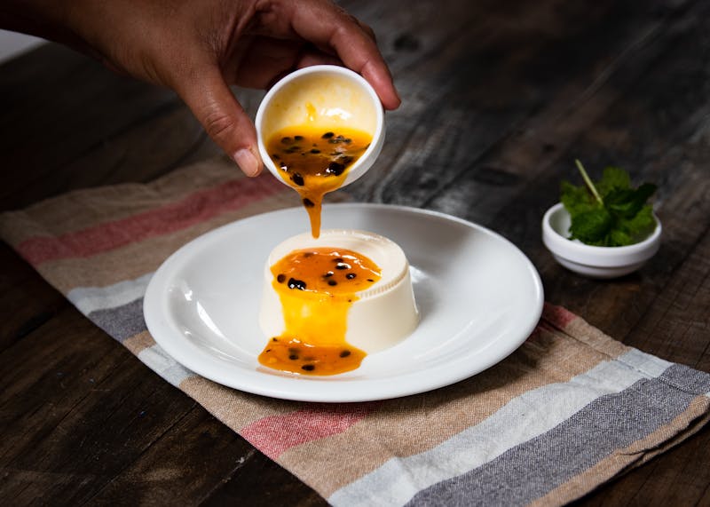 Panna Cotta Italian cream dessert with berry coulis
