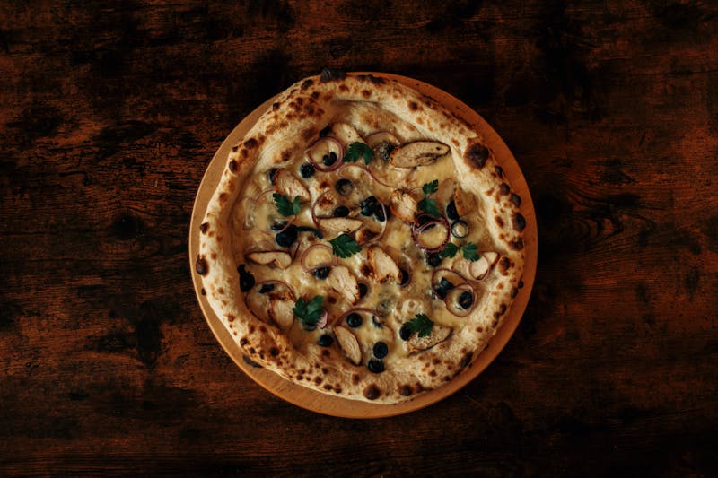 Prosciutto e Rucola Punch Pizza with cured ham and rocket