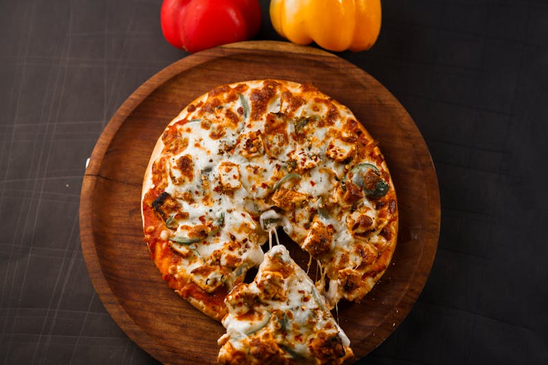 Truffle Mushroom speciality punch pizza with black truffle oil